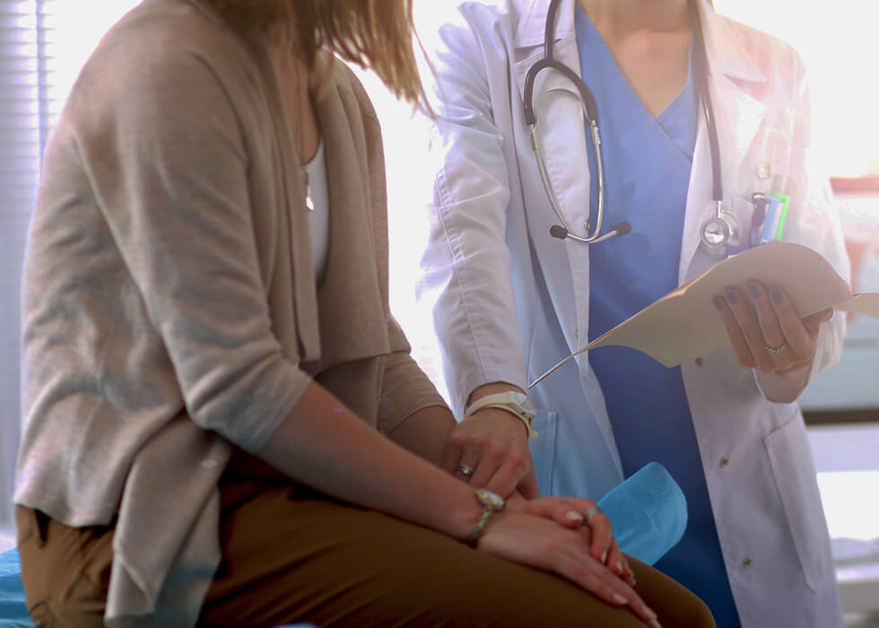 doctor consulting with patient on how to prepare for future visits